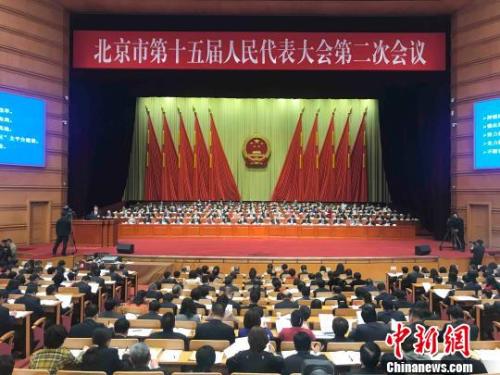 北京市十五屆人大二次會議14日開幕。北京市長陳吉寧向大會作政府工作報告?！∫?攝